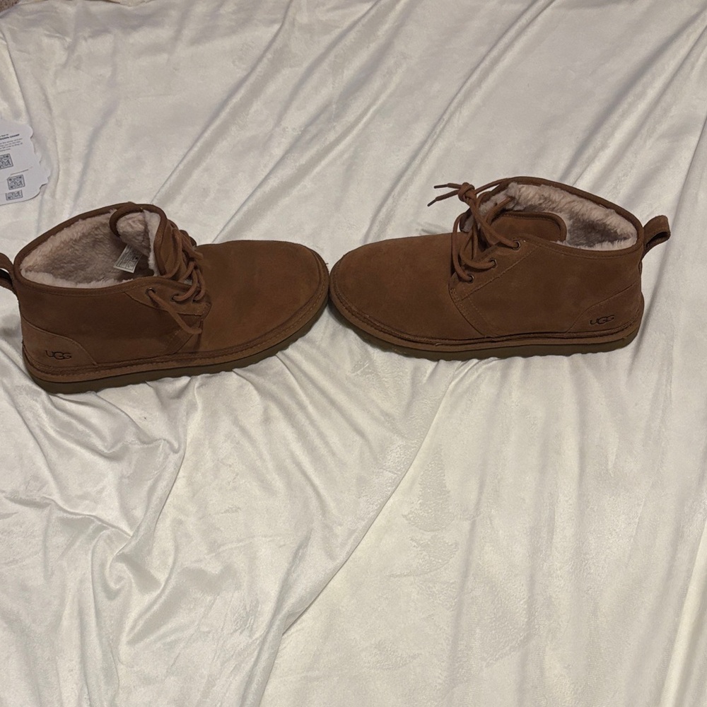 Men’s UGG mid sized boots.